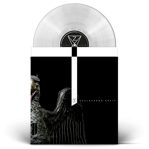 Clear vinyl record with black album cover featuring a bird-like figure.