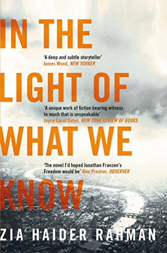 Book cover: “In the Light of What We Know” with city skyline.