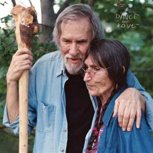 Album cover featuring a gray-haired couple embracing, with text “Dance of Love”.