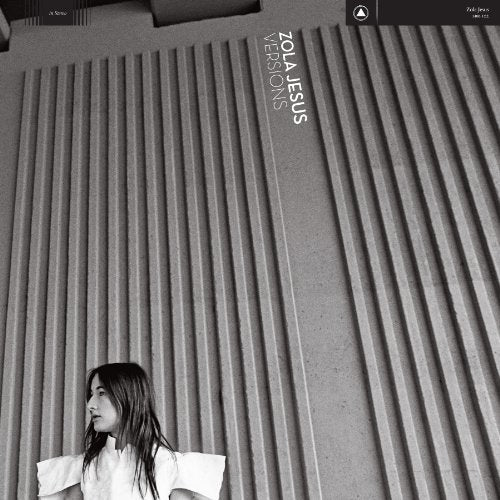 CD cover for “Versions” by Zola Jesus, featuring a woman’s portrait.