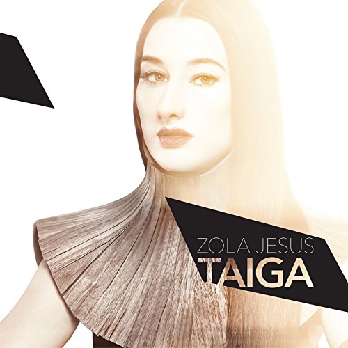 Portrait of Zola Jesus with long hair and album title "Taiga".