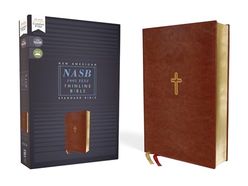 Brown leather-look Bible with gold cross detail, shown with its box.