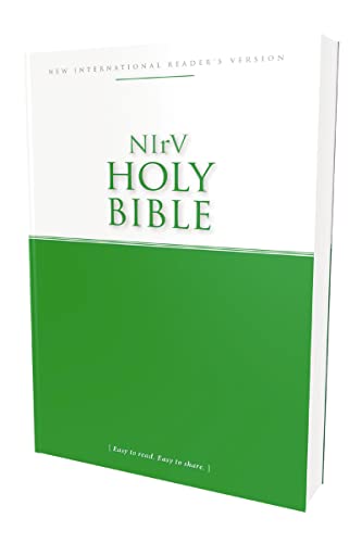 White Bible with green cover, title “NIrV Holy Bible” in gold lettering.