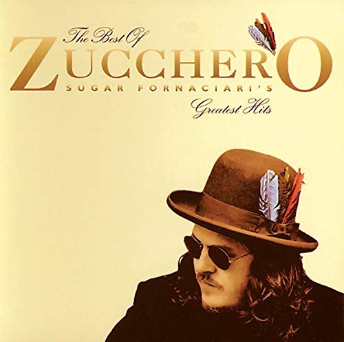 Zucchero album cover featuring the artist in a hat and sunglasses.