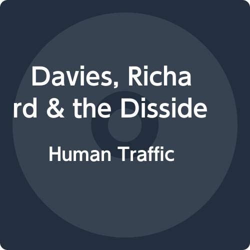 Dark blue vinyl record label with white text: “Human Traffic”.