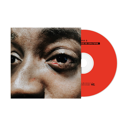 "CD case with a close-up image of a man's face and a red CD."
