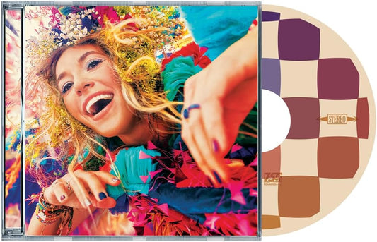 "CD case with Lauren Daigle's image and a checkered CD."