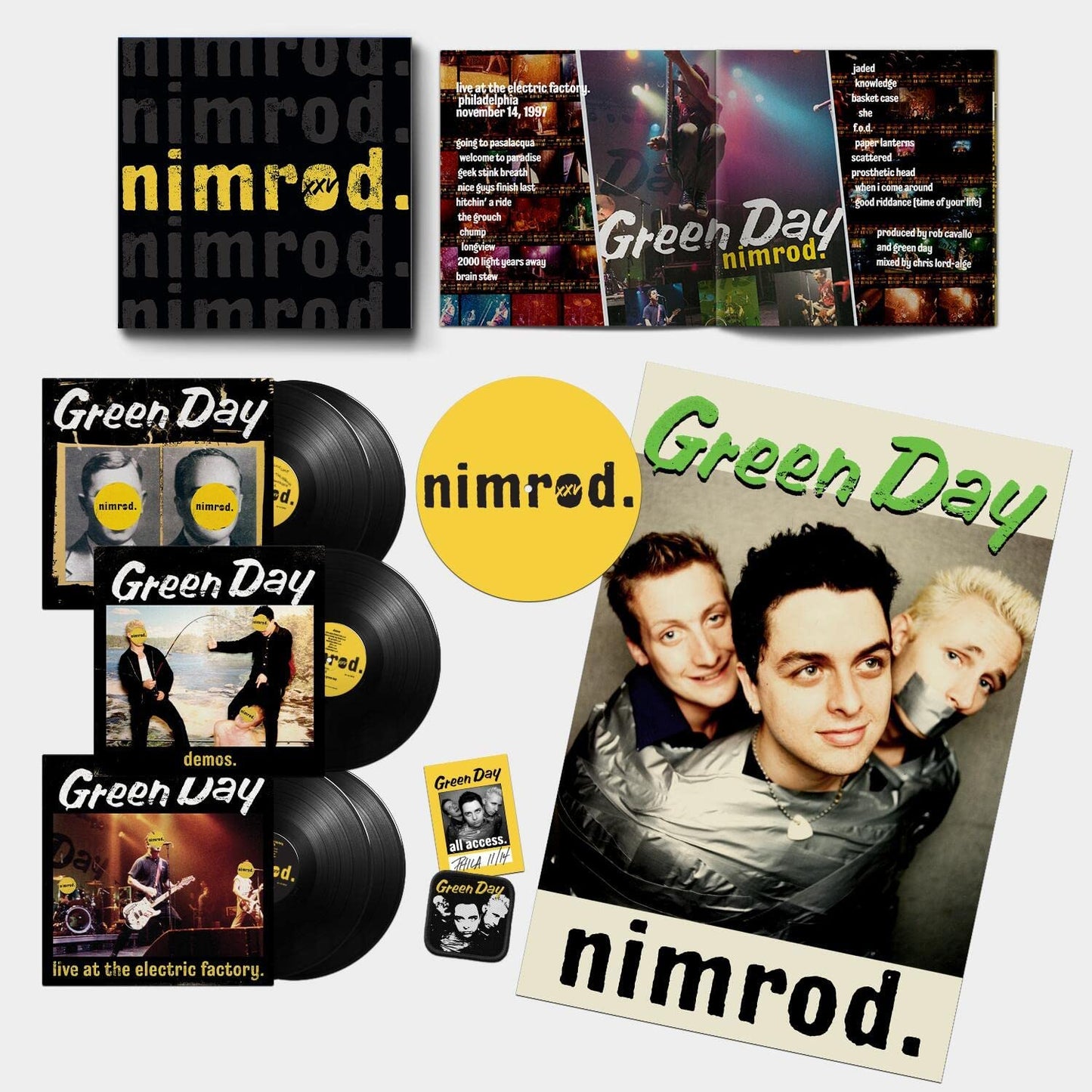 "Green Day Nimrod vinyl record set with various album covers and vinyl records displayed."