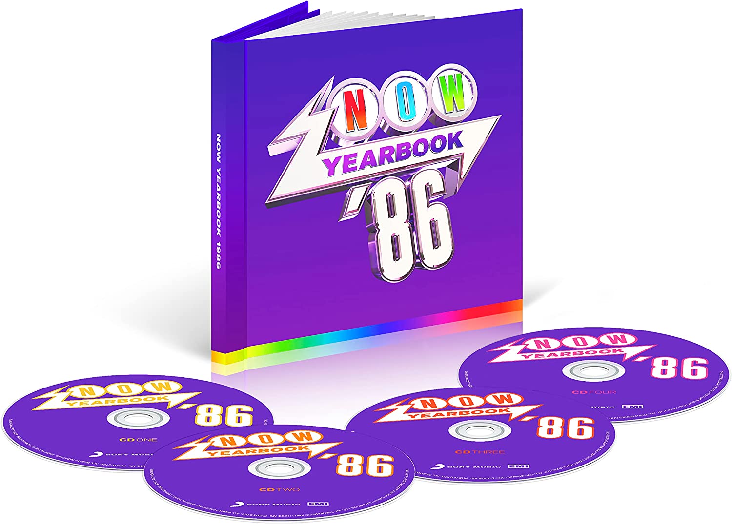 "Purple 'NOW YEARBOOK '86' book with rainbow edge and four matching CDs."