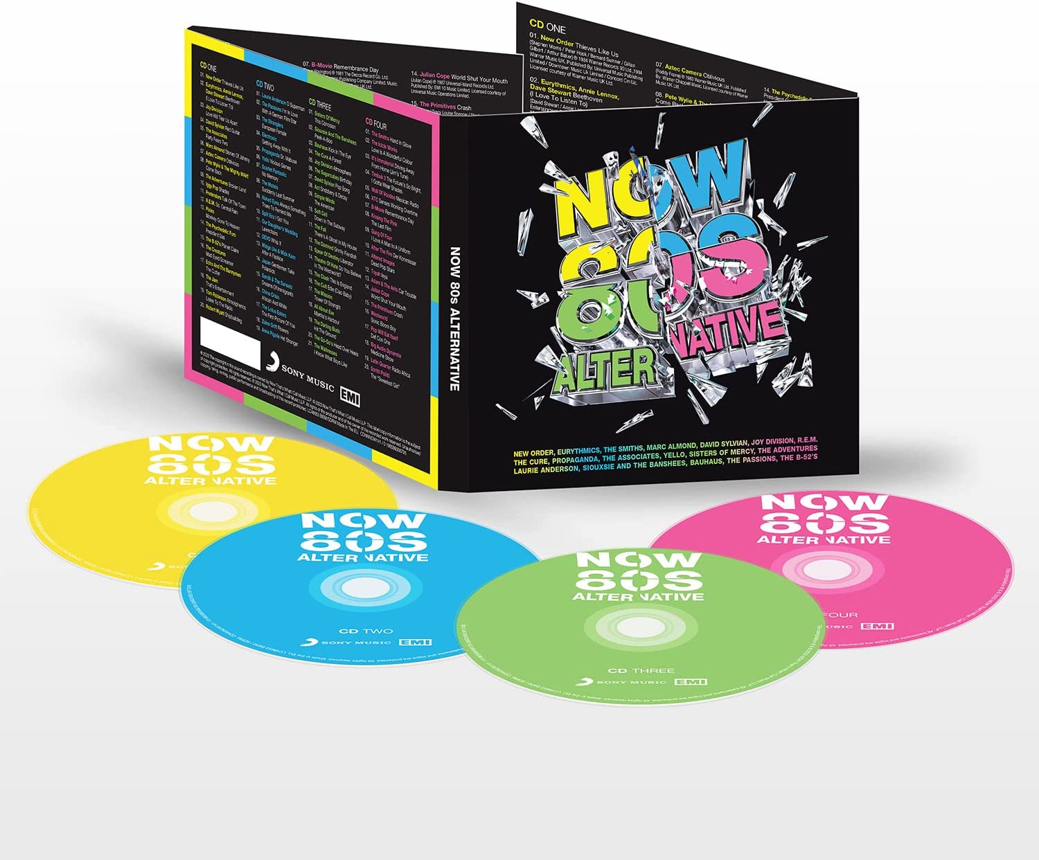 "Four CDs in yellow, blue, green, and pink, with a black box."