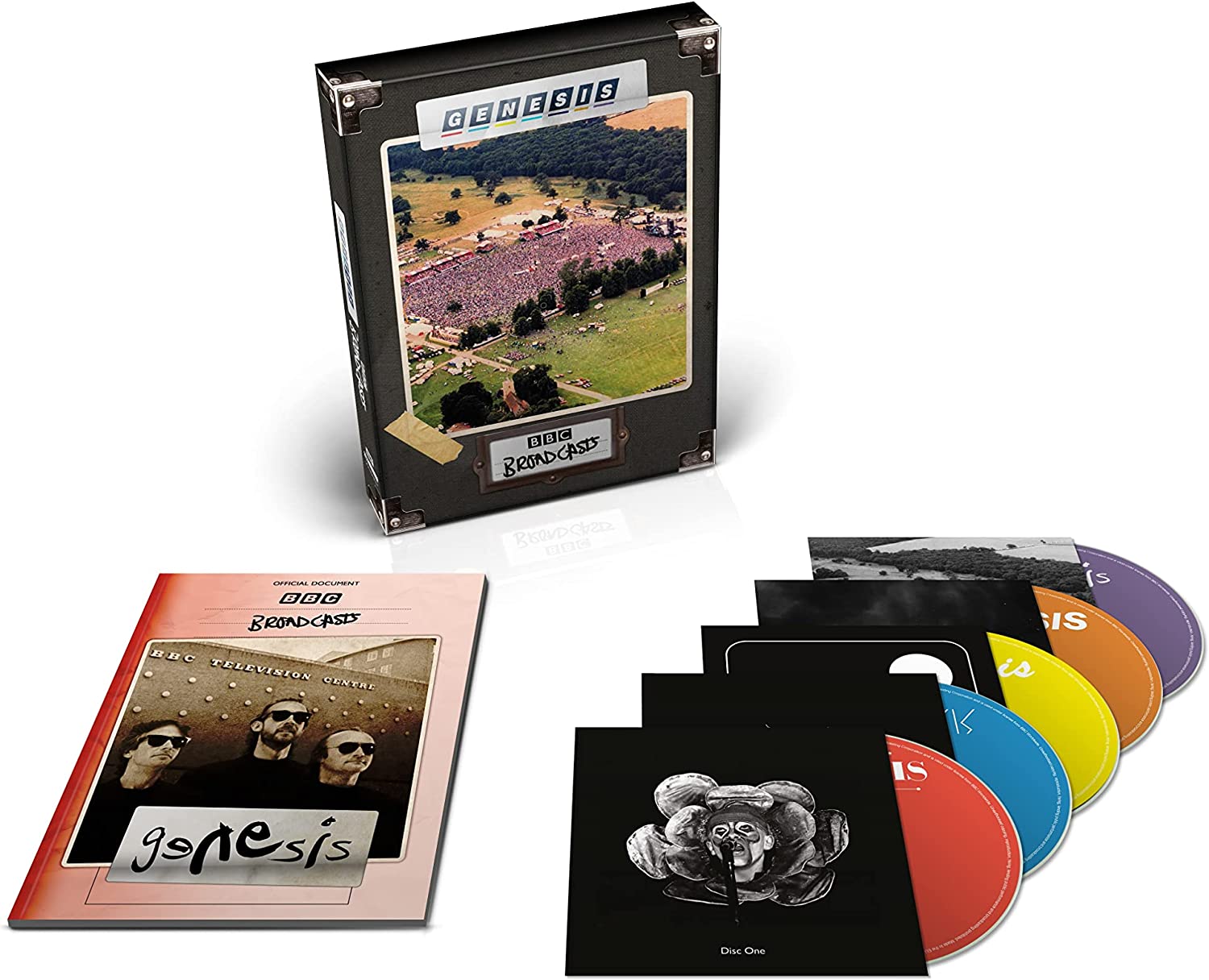 "Black CD case with concert image, booklet, and five colored CDs."