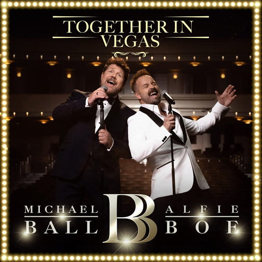 Alfie Boe and Michael Ball on stage, album cover with gold border.