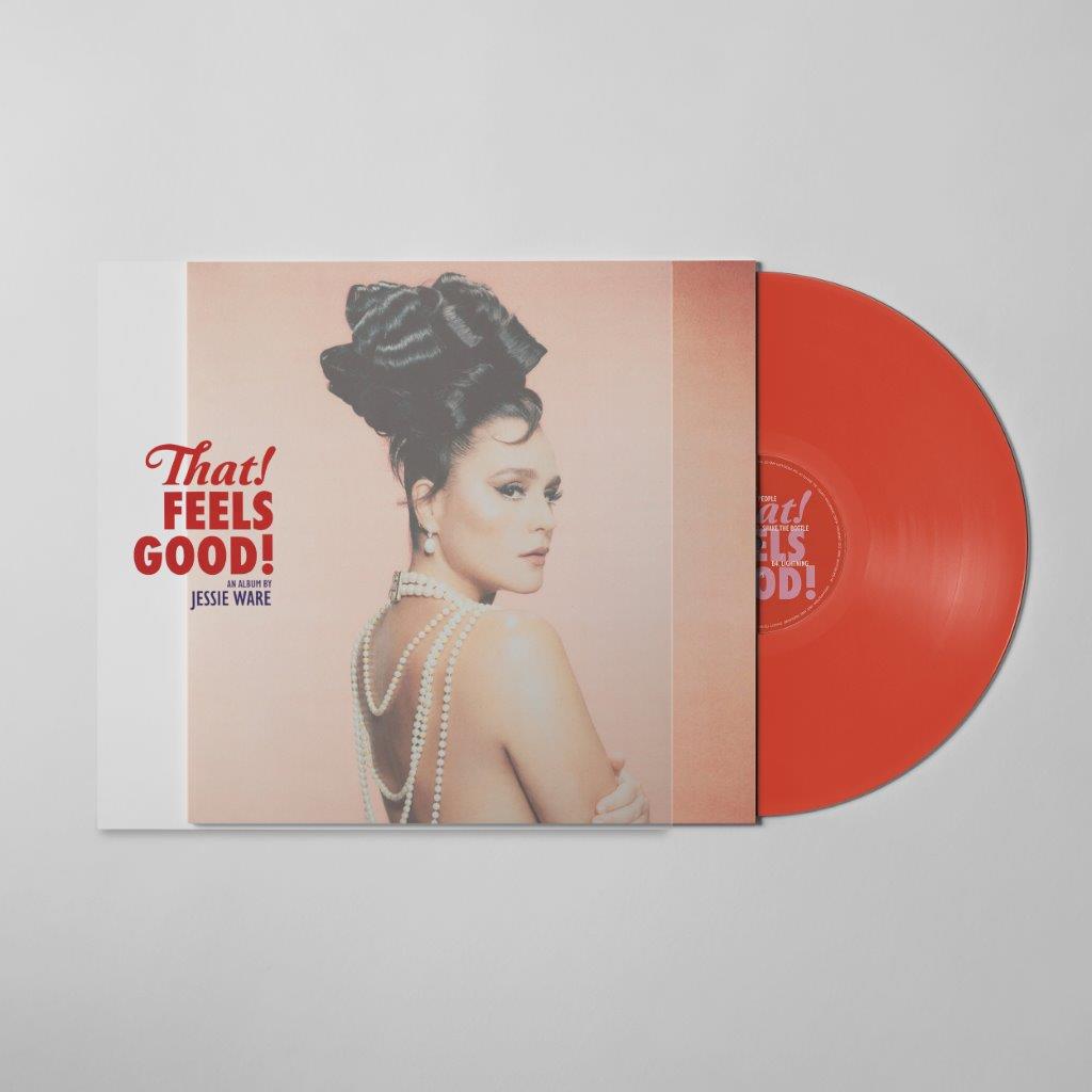 Red vinyl record with peach album cover featuring a woman in pearls.