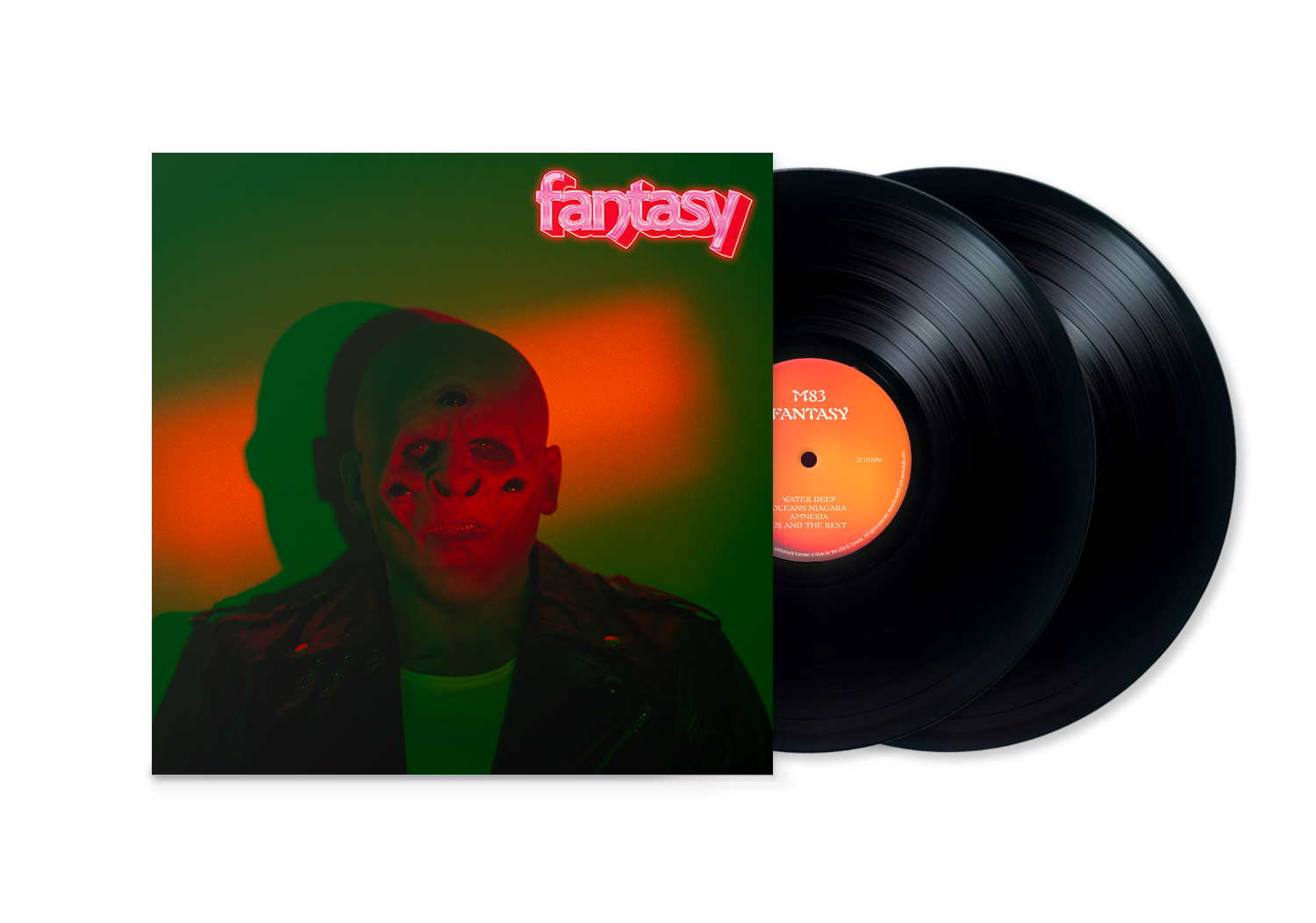 "Double vinyl record with green and orange album cover featuring a man's face."