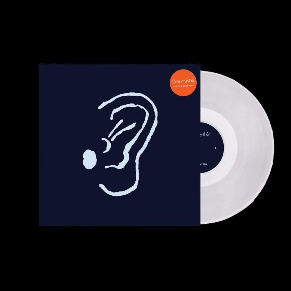Vinyl record sleeve with white ear illustration and white vinyl partially visible.