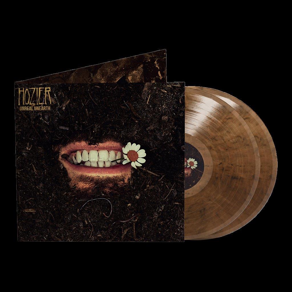 "Hozier's 'Unreal Unearth' vinyl record with brown marbled disc and matching album cover."