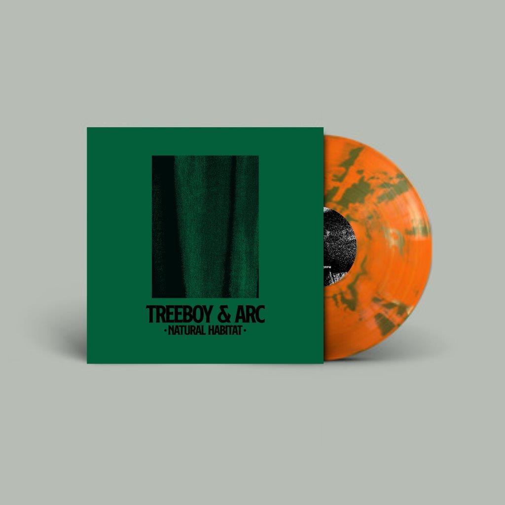 "Green vinyl record sleeve with orange and green marbled vinyl record partially visible."