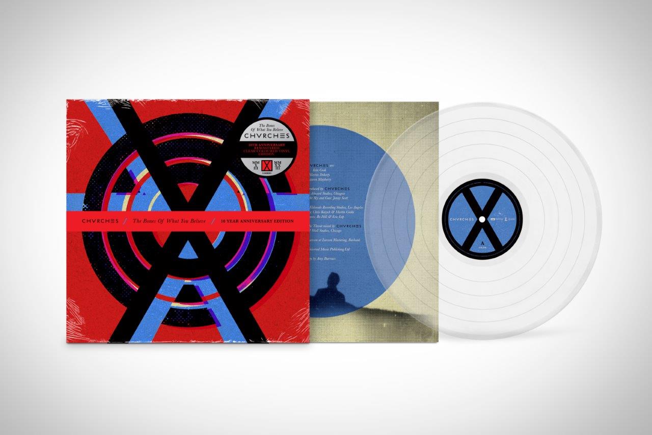 "Sealed vinyl record album with red cover and white vinyl disc."