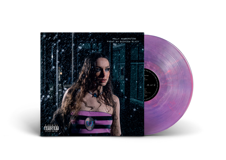 "Purple vinyl record with album cover featuring a woman in a purple striped top."