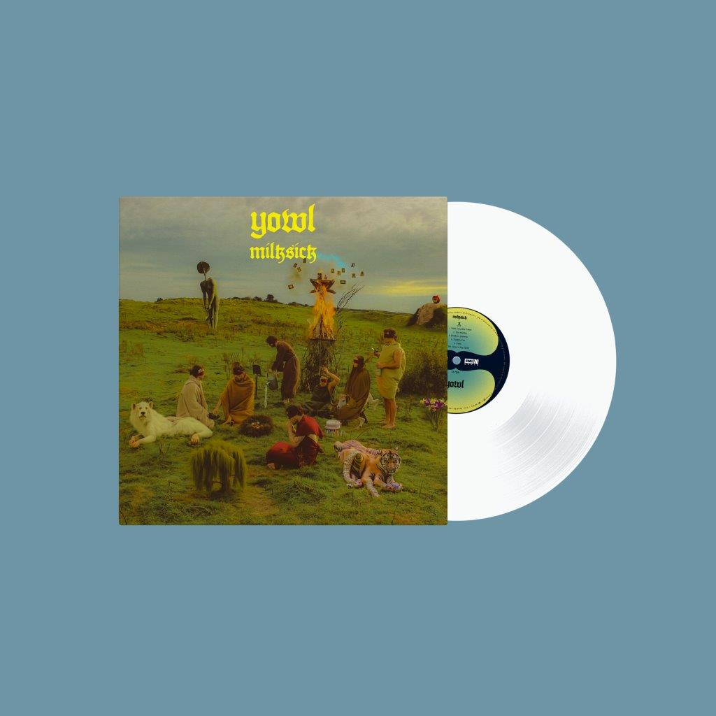 "White vinyl record with cover art featuring people in a field, blue background."
