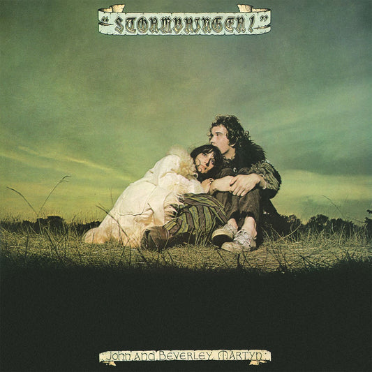 "Album cover with couple embracing in a field, green sky, 'Stormbringer!' title."