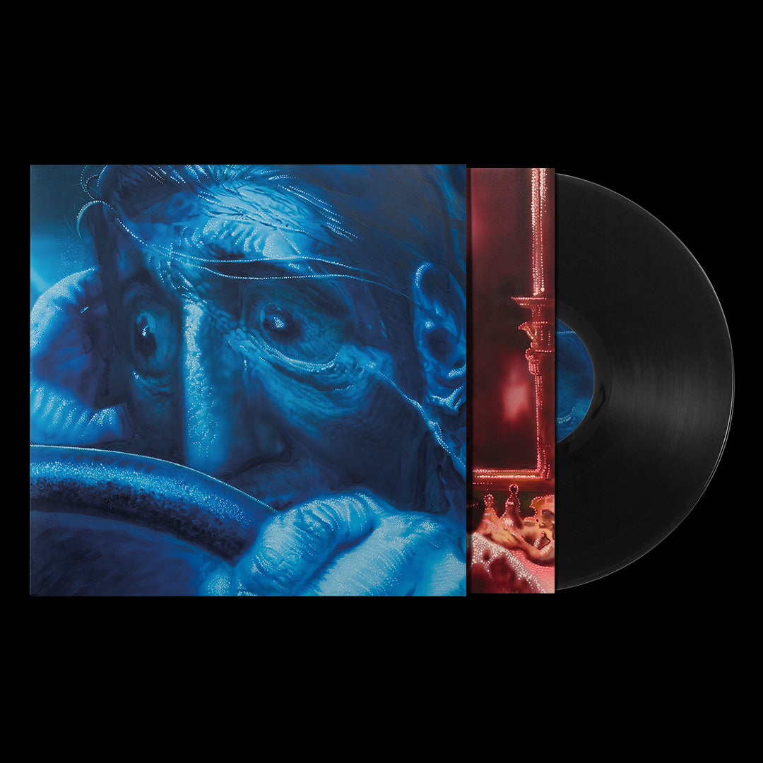 "Vinyl record with blue and red cover art featuring a close-up of a man's face."