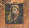 Nollaig Casey album cover featuring a woman with long hair against an orange background.