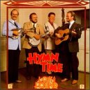 "CD cover with four men in suits holding guitars, 'Hymn Time' and 'The Lost & Found' text."
