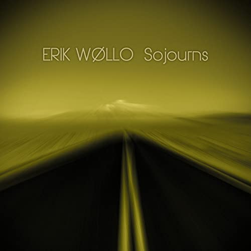 CD cover: blurred highway receding into a distant, hazy mountain.