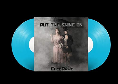 Turquoise vinyl records with album cover featuring a couple in Victorian attire.