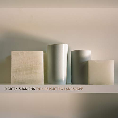 A CD cover featuring four abstract, cylindrical objects on a shelf, with text below.