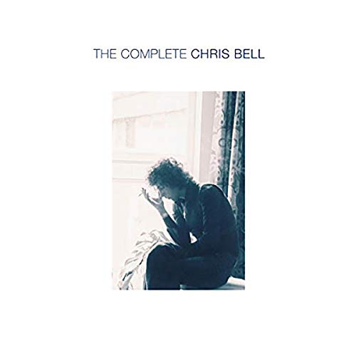 "Album cover with a black and white photo of a man sitting by a window."