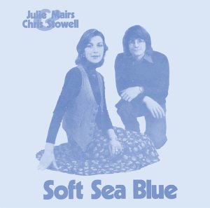 CD album cover with blue-toned image of a man and woman.