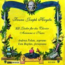 "Yellow CD cover with blue banner, portrait, and floral decorations, featuring Haydn's name."