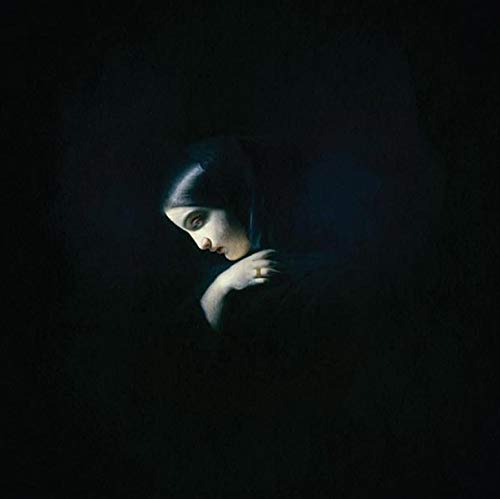 "Album cover with a dark image of a woman in a hooded cloak."