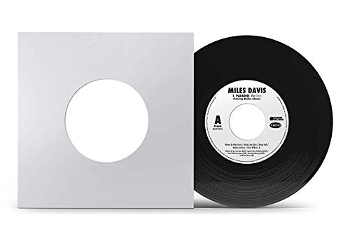 Vinyl record with white label and sleeve, displaying "Miles Davis" on a white background.