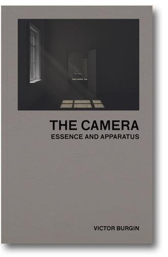 The image depicts a book titled "The Camera: Essence and Apparatus" by Victor Burgin. A suitable alt text could be: "Beige book cover with dark room image and black text."