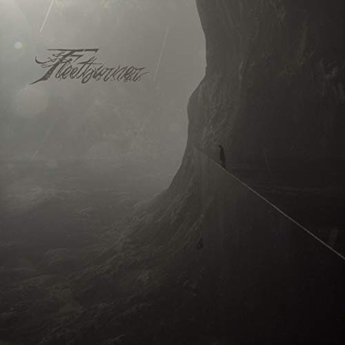 The vinyl album cover features a dark, misty forest scene with a large tree trunk.