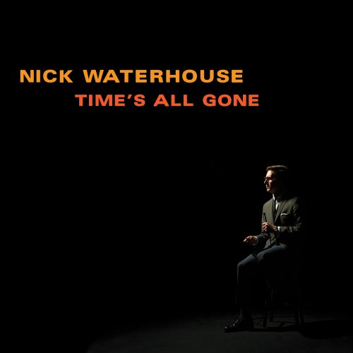 "Album cover with a man sitting on a chair in a dark room."