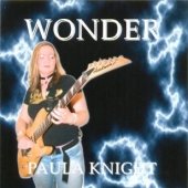 Album cover: woman holding guitar, surrounded by lightning, with "WONDER" and "PAULA KNIGHT" text.