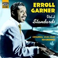 Erroll Garner album cover featuring a man at a piano with yellow and white text.