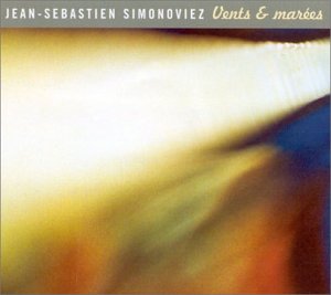 The image is a CD cover with a blurry, abstract background and an Amazon logo.