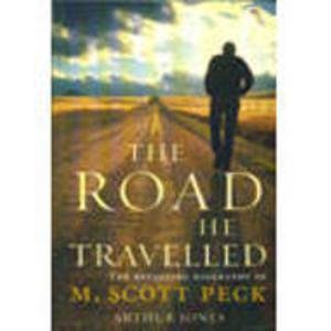 "Book cover with a dirt road in a field and cloudy sky, titled 'The Road Less Travelled'."