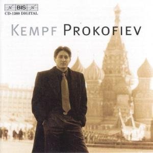 CD cover featuring a man in a suit with a cathedral in the background.