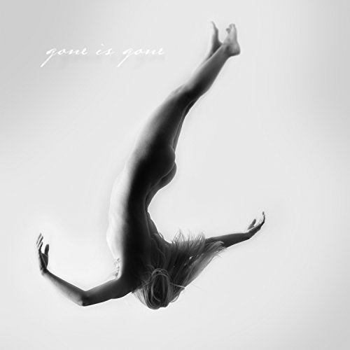 Black and white album cover with a woman falling upside down, hair flowing.