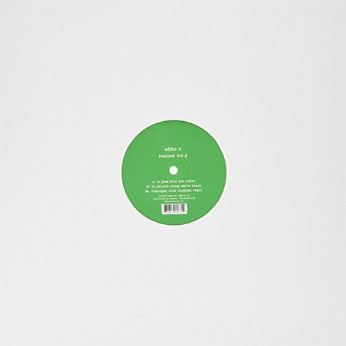 A green vinyl record with white text and a barcode on a plain white background.