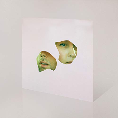 A white vinyl record sleeve with two cut-out faces on a plain background.