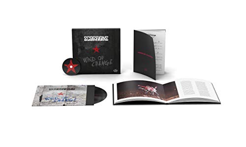"Scorpions vinyl record packaging with black cover, booklet, and vinyl sleeve on white background."