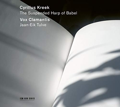 "CD cover with open book and shadow, featuring white text on dark background."