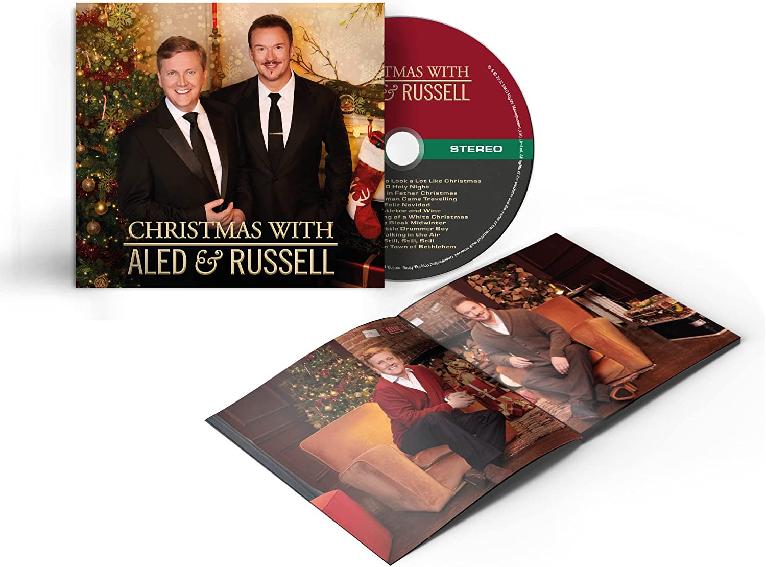 "CD case with disc and booklet, featuring two men in formal and casual attire."